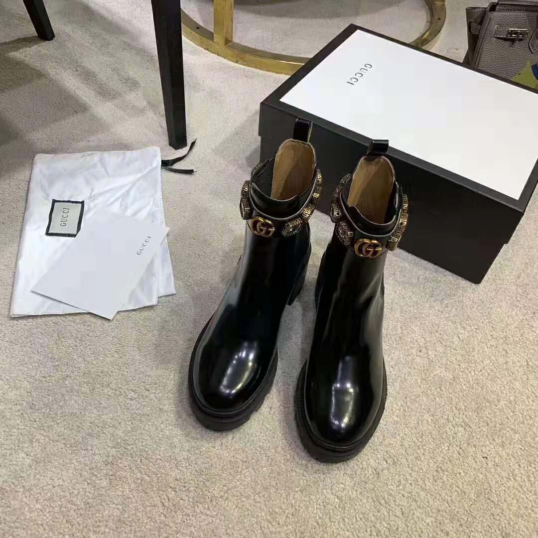 Gucci Women Leather Ankle Boot with Belt 6 cm Heel in Black Shiny Leather