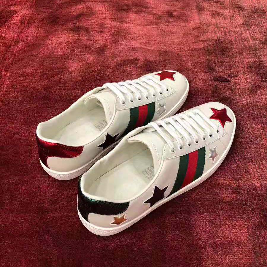 Gucci Women’s Ace Embroidered Sneaker in White Leather with Inlaid Multicolor Stars