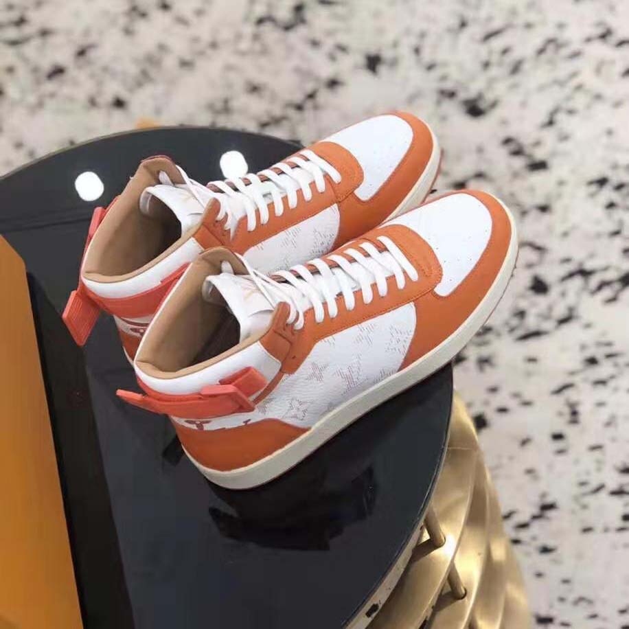Louis Vuitton LV Unisex Rivoli Sneaker Boot in Monogram Grained Calf Leather-Orange