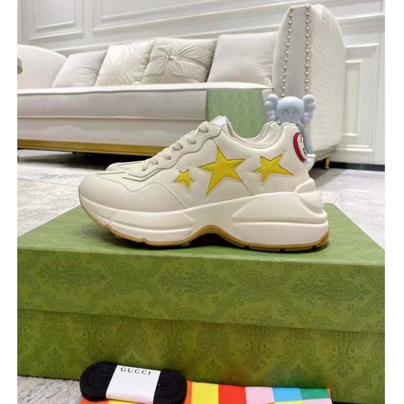Gucci Unisex GG Rhyton Sneaker White Demetra Inlaid Interlocking G Stars Rubber Low Heel