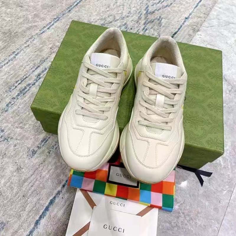 Gucci Unisex GG Rhyton Sneaker White Demetra Inlaid Interlocking G Stars Rubber Low Heel