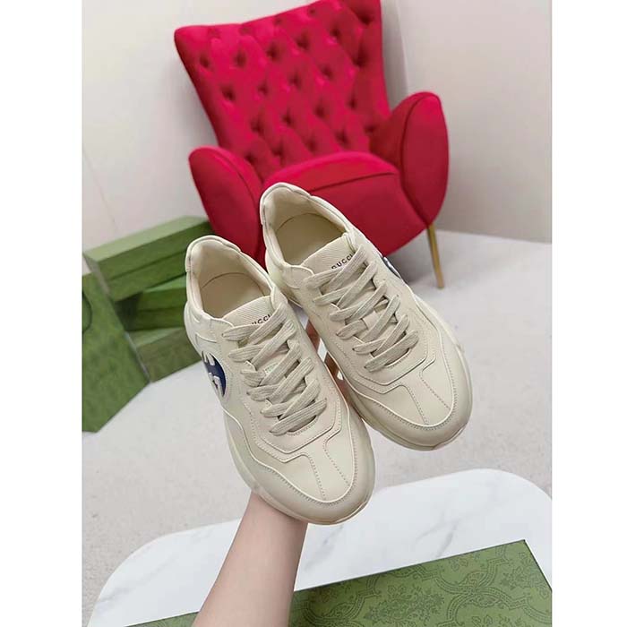 Gucci Unisex Interlocking G Rhyton Sneakers Ivory Leather Navy Cut-Out Rubber Sole
