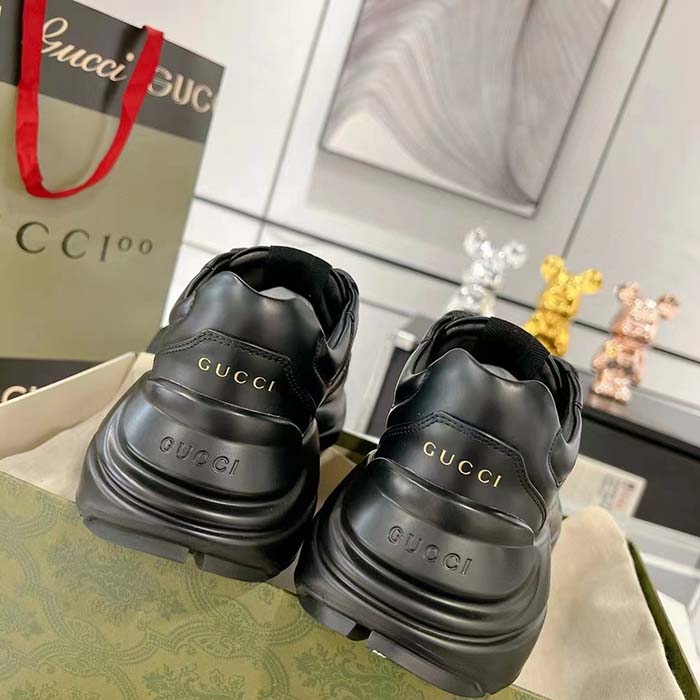 Gucci Unisex GG Rhyton Sneaker Black Leather Rubber Sole Lace-Up Mid-Heel