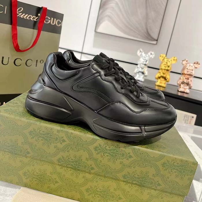 Gucci Unisex GG Rhyton Sneaker Black Leather Rubber Sole Lace-Up Mid-Heel