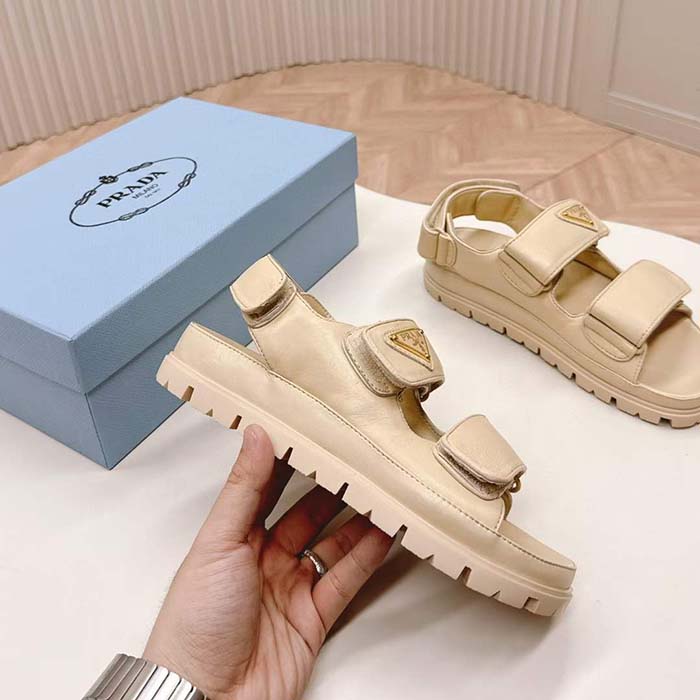 Prada Women Patent Leather Sandals Beige Metal Lettering Logo Lug Tread
