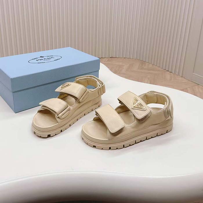 Prada Women Patent Leather Sandals Beige Metal Lettering Logo Lug Tread